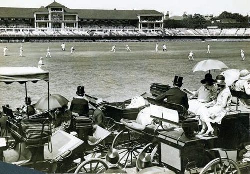 Horse-drawn carriages parked around the boundary at Lords